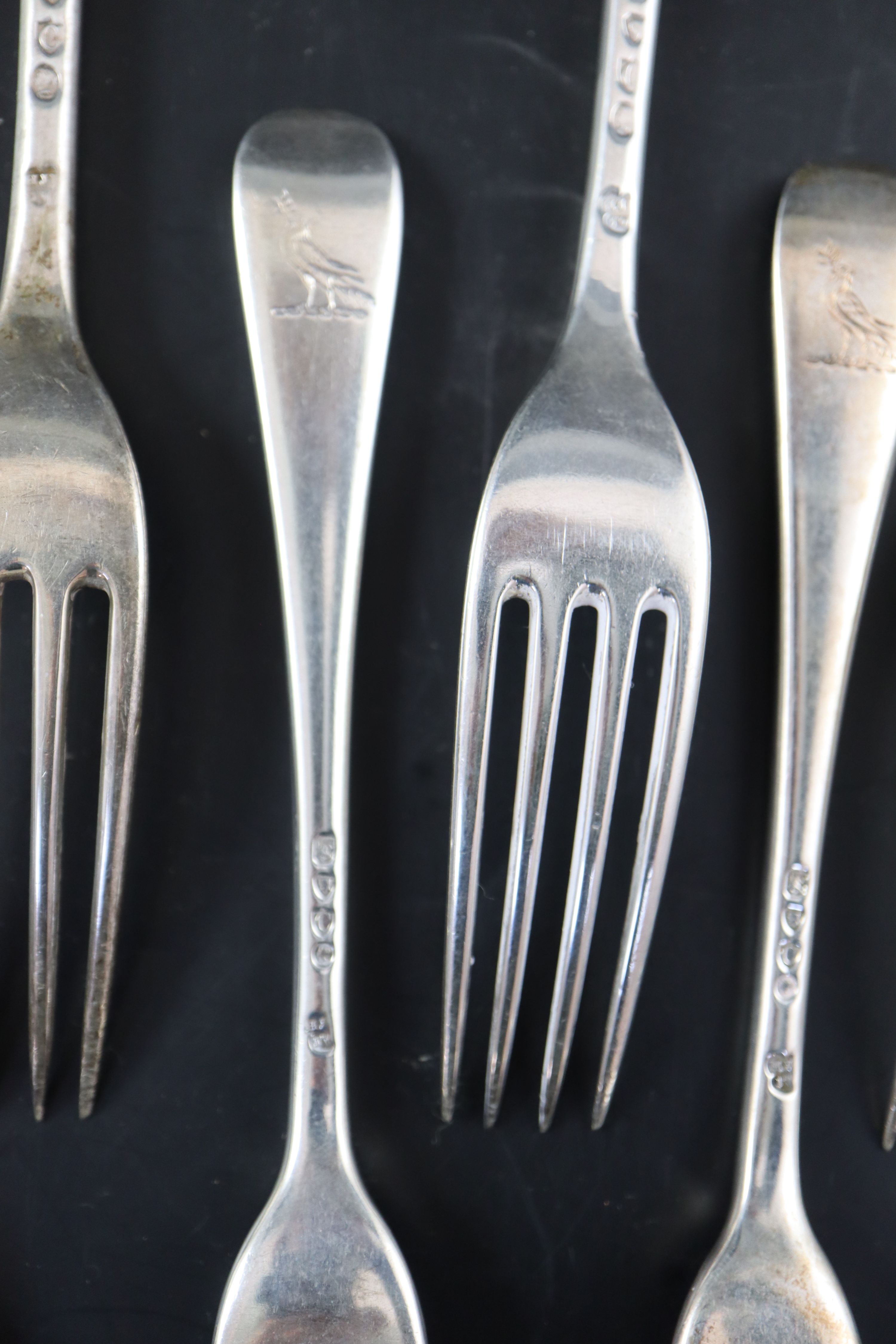 Eight Victorian silver Old English pattern table forks and eight matching entree forks